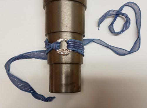 Judy Larson's Ribbon Wrapped Bracelet tips - , Wire Jewelry Design, Design, metallic cylinder with a light blue ribbon